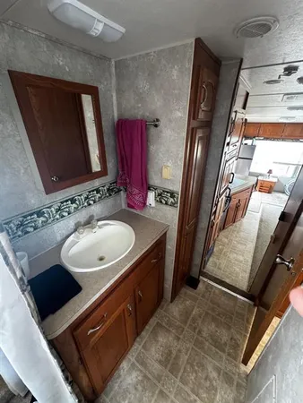a bathroom with a sink and a toilet