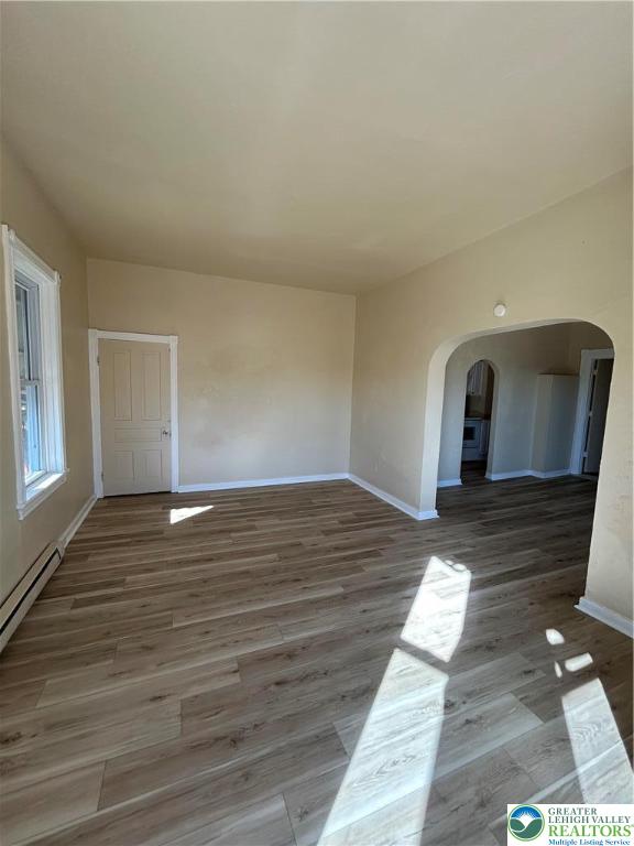 201 Main Street, Unit 2 Slatington, PA 18080 - Photo 3 of 9 a view of a room with wooden floor and window