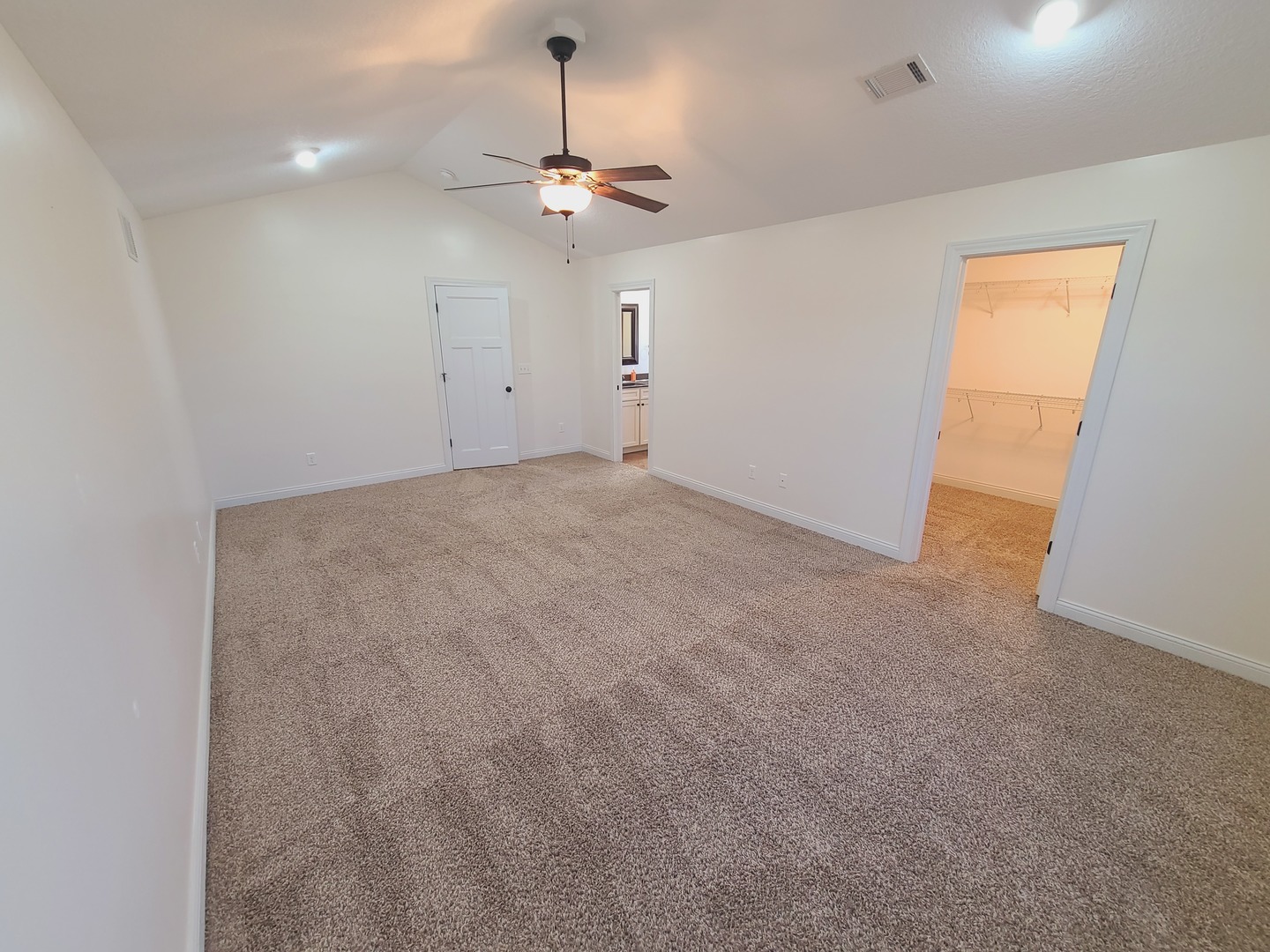 790 Muirfield Circle Eldridge, IA 52748 - Photo 17 of 36 a view of an empty room with a chandelier fan