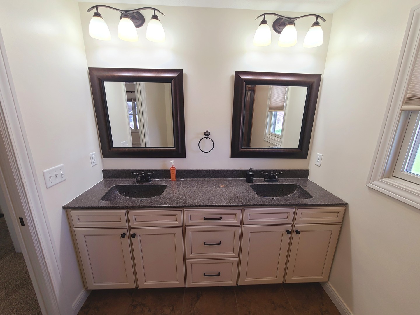 790 Muirfield Circle Eldridge, IA 52748 - Photo 19 of 36 a bathroom with a double vanity sink and mirror