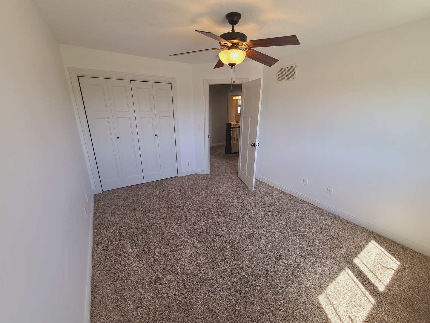 790 Muirfield Circle Eldridge, IA 52748 - Photo 24 of 36 a view of room with a ceiling fan