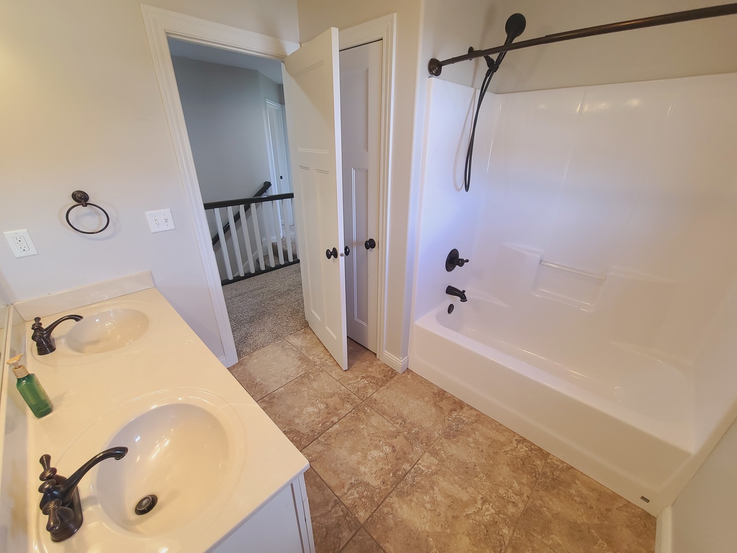790 Muirfield Circle Eldridge, IA 52748 - Photo 29 of 36 a bathroom with a tub sink vanity and shower