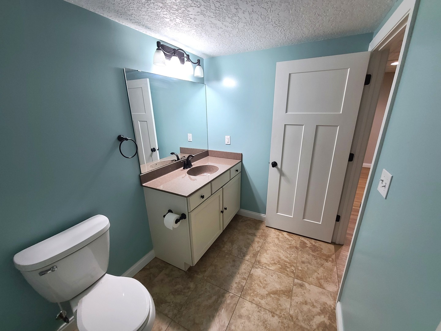 790 Muirfield Circle Eldridge, IA 52748 - Photo 32 of 36 a bathroom with a toilet sink and mirror