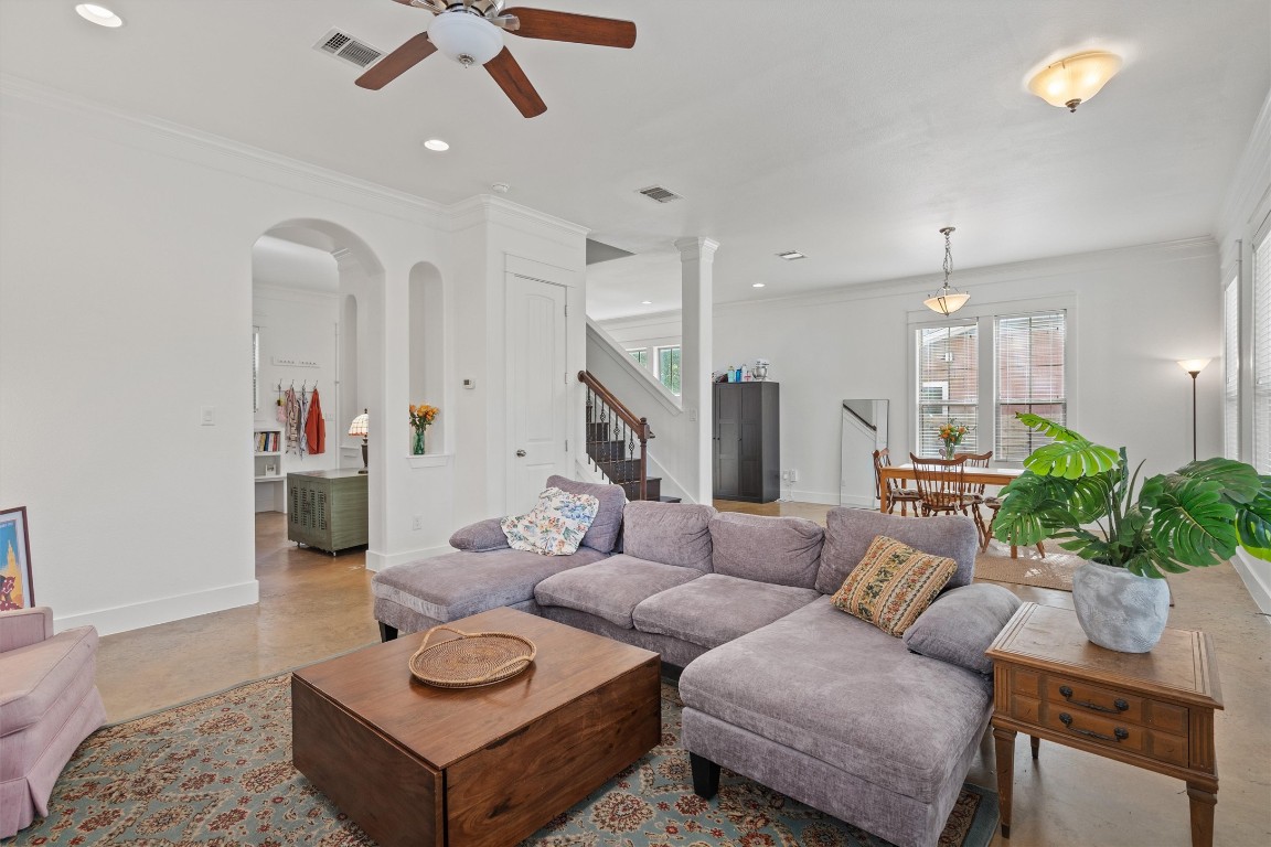 500 West 55th 1/2 Street, Unit A AND B Austin, TX 78751 - Photo 3 of 32 a living room with furniture and a chandelier