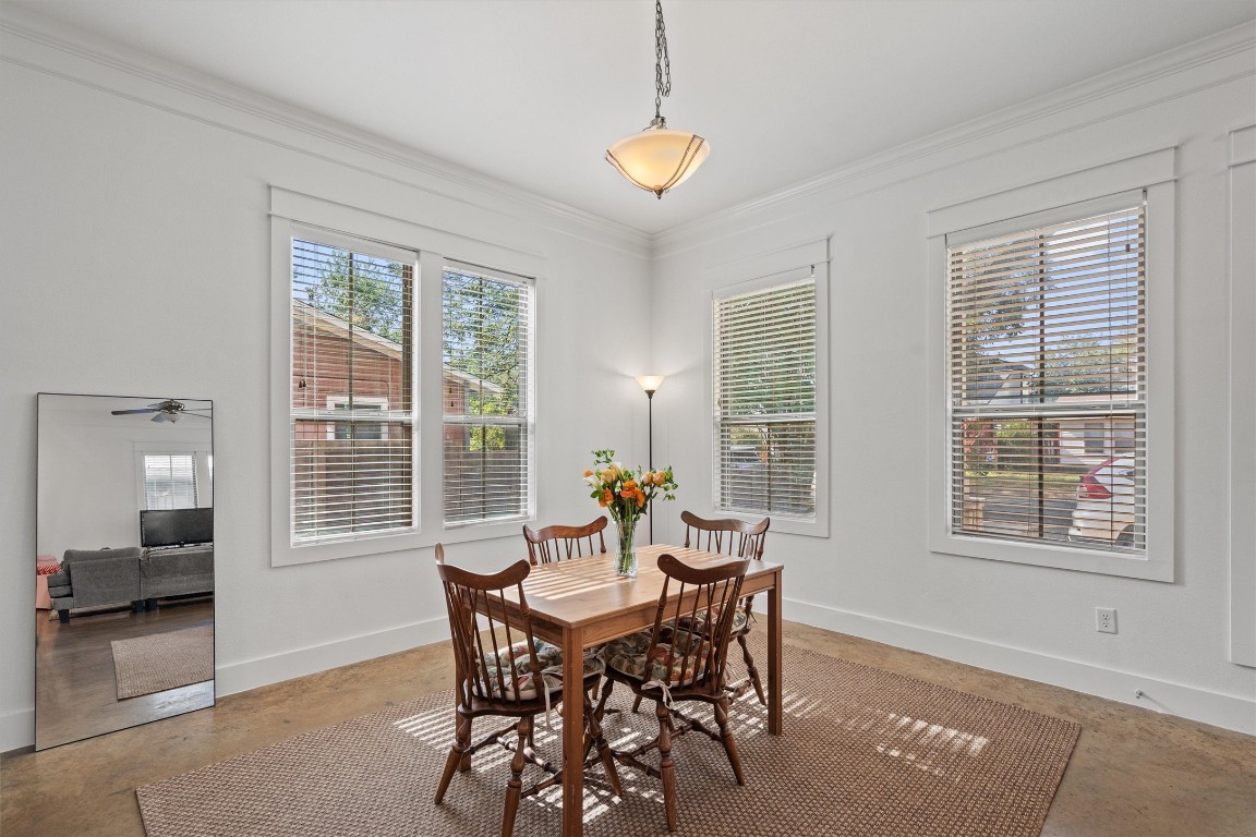 500 West 55th 1/2 Street, Unit A AND B Austin, TX 78751 - Photo 6 of 32 a dining room with furniture and window