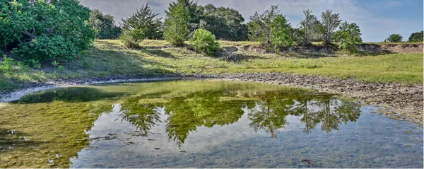 a view of a lake with beach