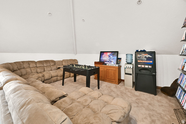 1085 Windsor Drive Provo, UT 84604 - Photo 39 of 83 Rec room featuring light colored carpet and lofted ceiling