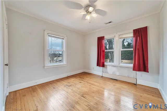 a bathroom with a sink a toilet a mirror a bathtub and shower