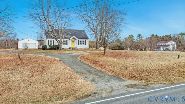 a view of a house with a fence