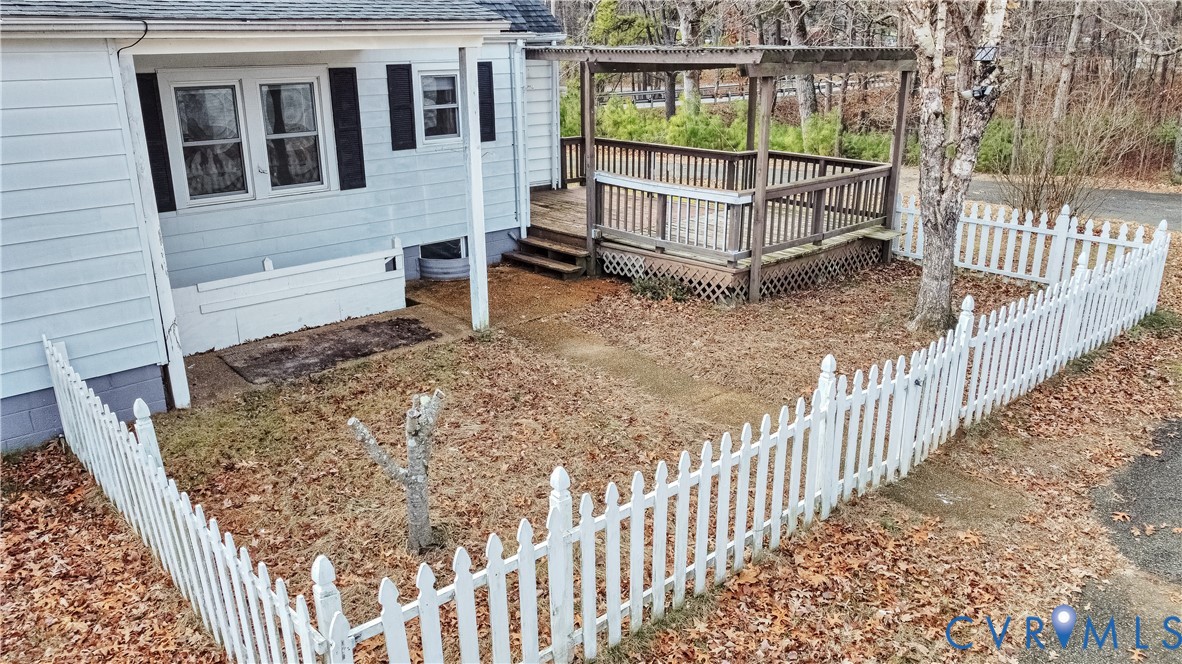 616 Broad St Road Manakin-Sabot, VA 23103 - Photo 35 of 45 View of side of home with a wooden deck and roof w