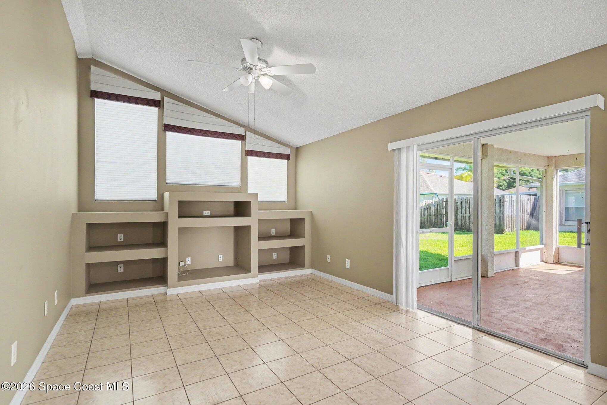 1154 Ida Way Melbourne, FL 32940 - Photo 12 of 27 Family Room to Porch