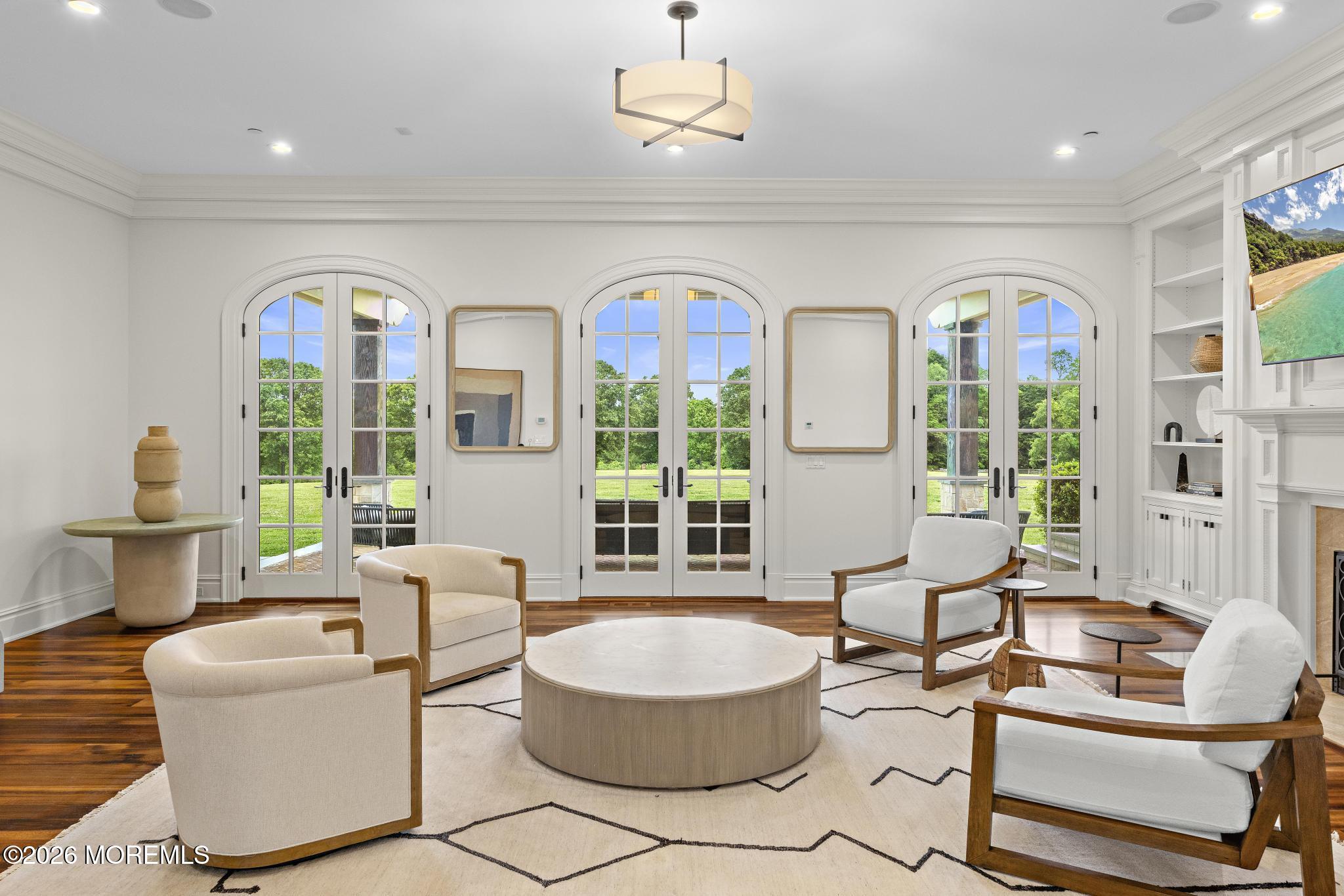 88 Montrose Road Colts Neck, NJ 07722 - Photo 7 of 73 a living room with furniture and a large window
