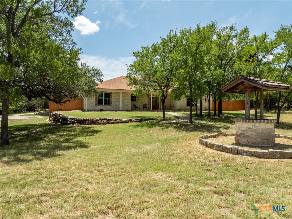 340 Sedro Trail Georgetown, TX 78633 - Photo 7 of 40 Front yard and wishing well