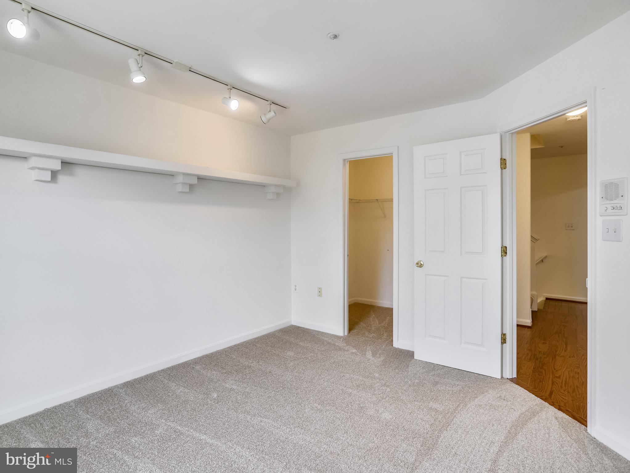8739 Spring Brook Way Odenton, MD 21113 - Photo 16 of 53 Bedroom 2 with walk-in closet and upgraded lights!