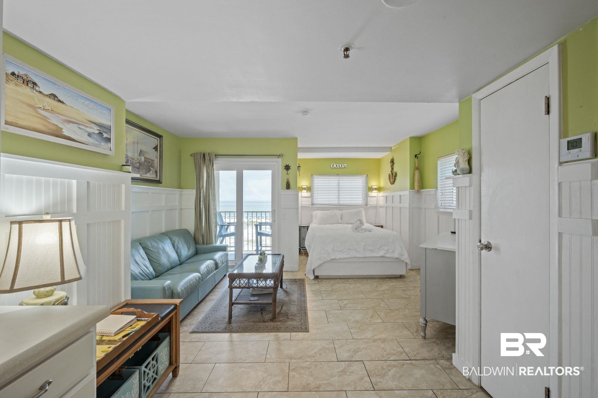 375 Plantation Road, Unit 5304 Gulf Shores, AL 36542 - Photo 6 of 42 Bedroom featuring wainscoting and a decorative wall