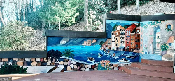 a view of outdoor space with chairs