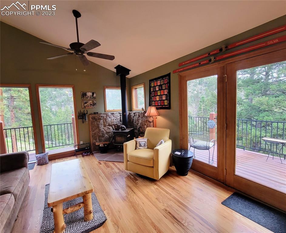 33348 Persistence Avenue Pine, CO 80470 - Photo 11 of 39 a living room with furniture and a large window