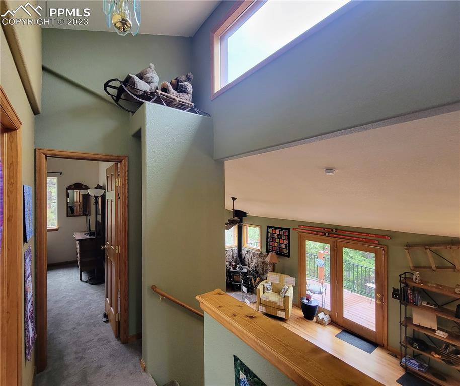33348 Persistence Avenue Pine, CO 80470 - Photo 20 of 39 a view of a livingroom with furniture and windows