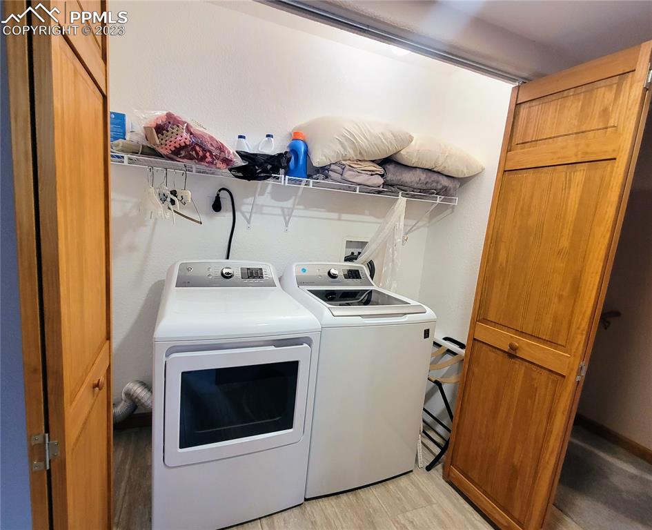 33348 Persistence Avenue Pine, CO 80470 - Photo 27 of 39 a utility room with dryer and washer