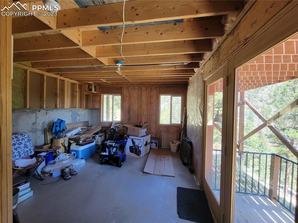 33348 Persistence Avenue Pine, CO 80470 - Photo 30 of 39 a living room with furniture