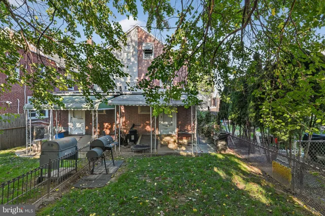 a couple of table and chairs in the garden