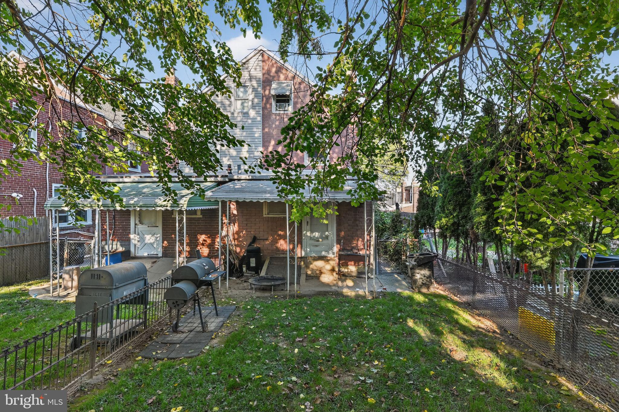 82 Marple Avenue Clifton Heights, PA 19018 - Photo 1 of 30 a couple of table and chairs in the garden