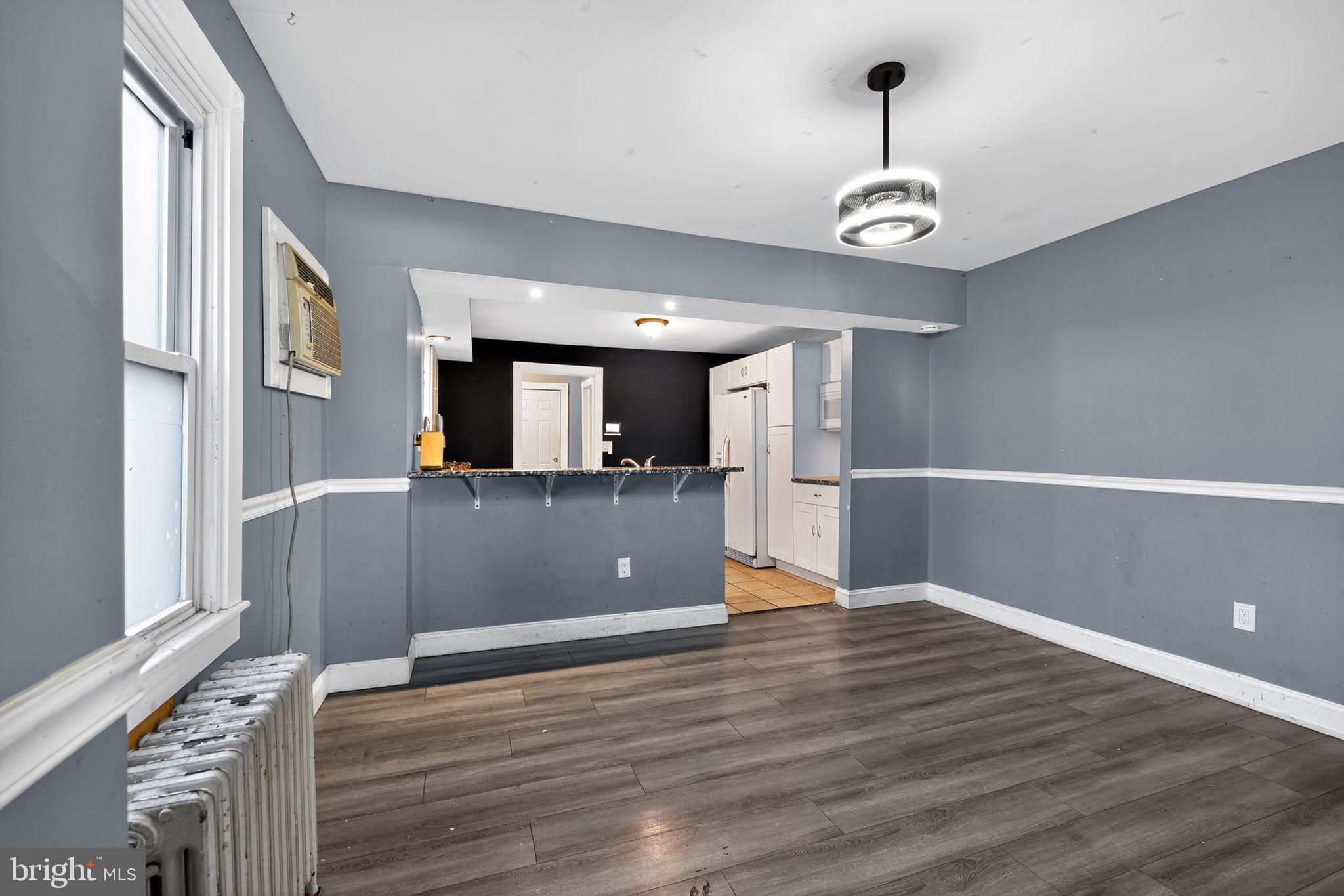 82 Marple Avenue Clifton Heights, PA 19018 - Photo 13 of 30 a view of a big room with wooden floor and windows