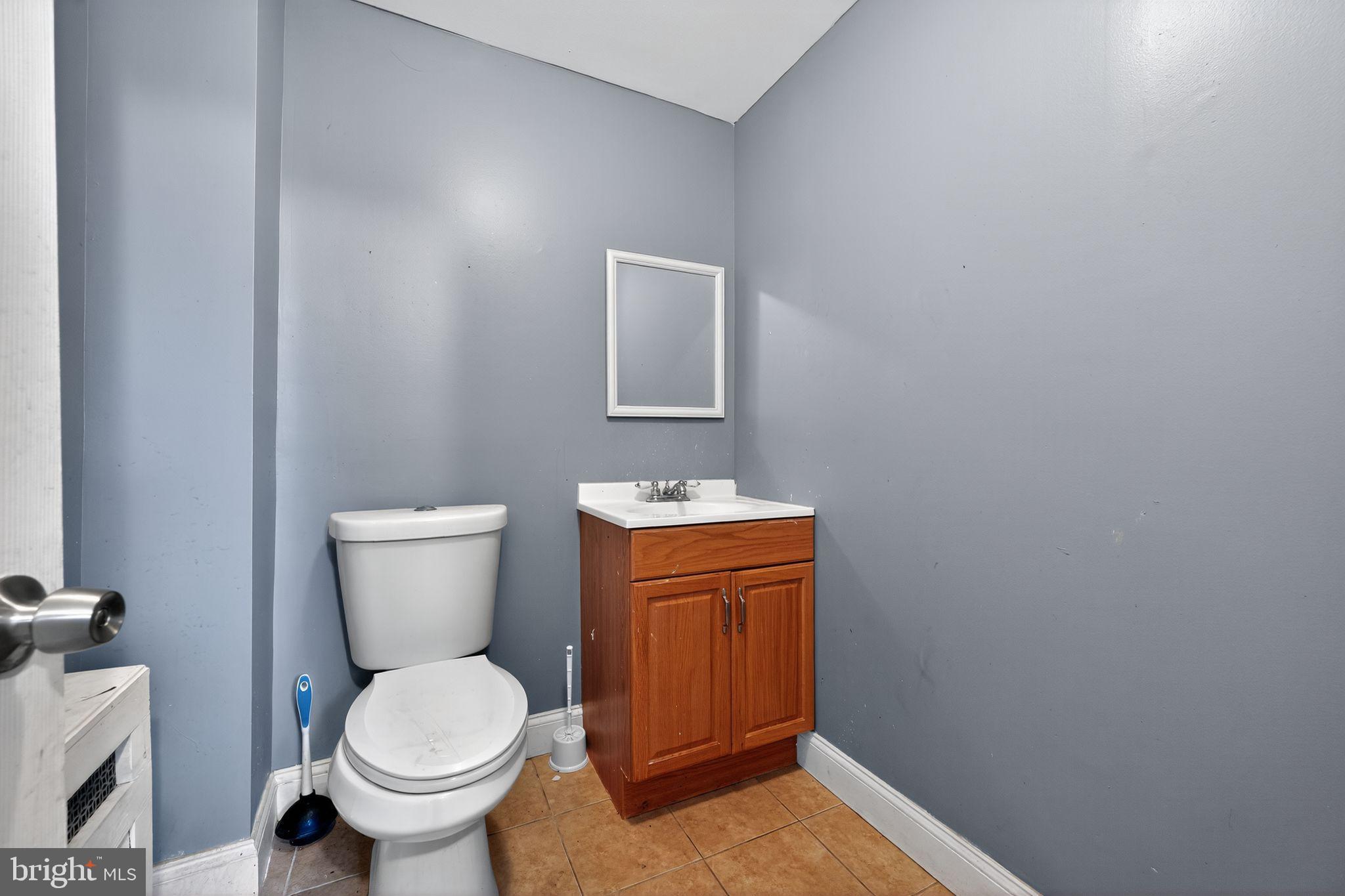 82 Marple Avenue Clifton Heights, PA 19018 - Photo 18 of 30 a bathroom with a sink and a toilet
