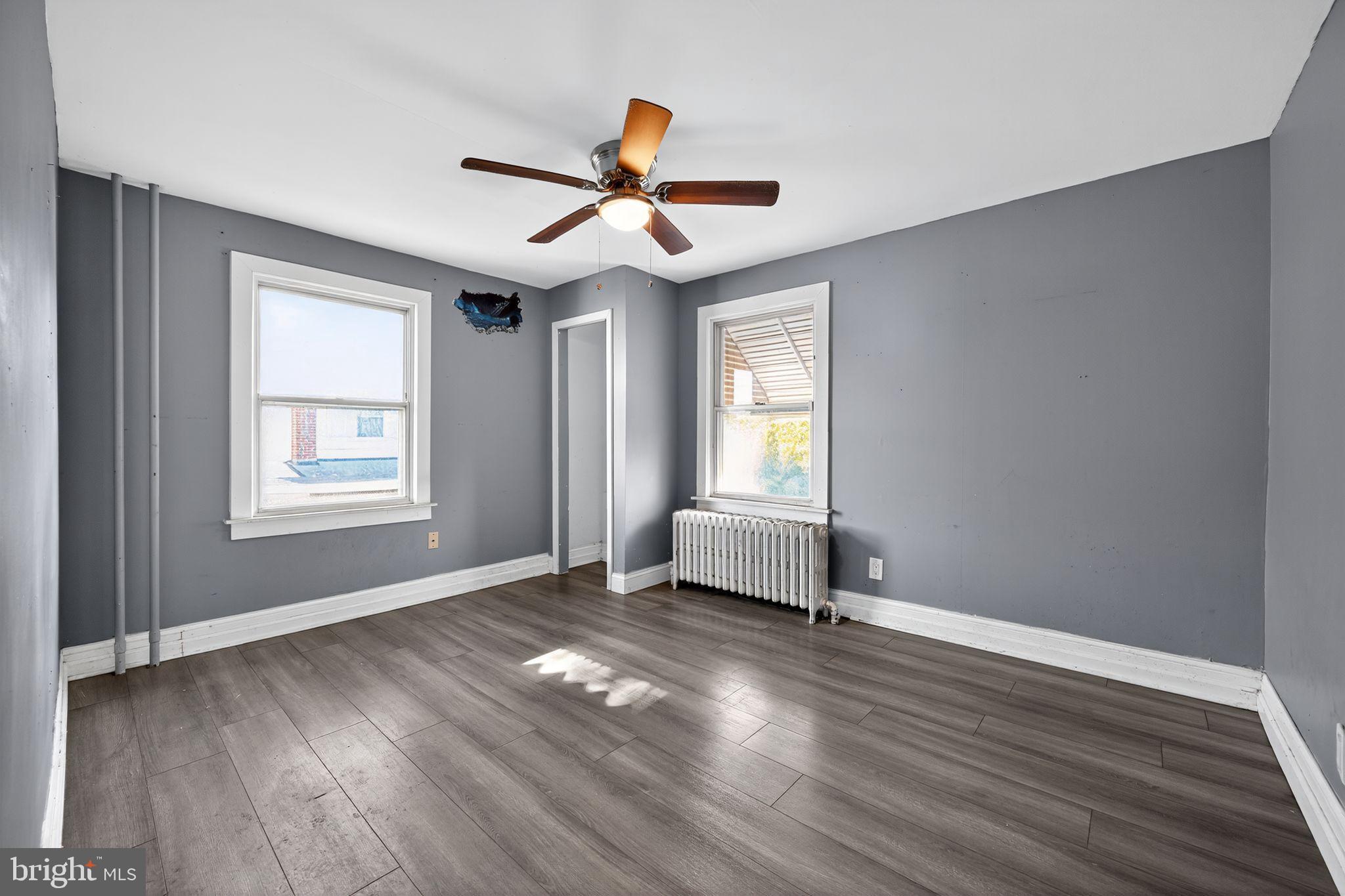 82 Marple Avenue Clifton Heights, PA 19018 - Photo 19 of 30 a view of empty room with wooden floor and fan