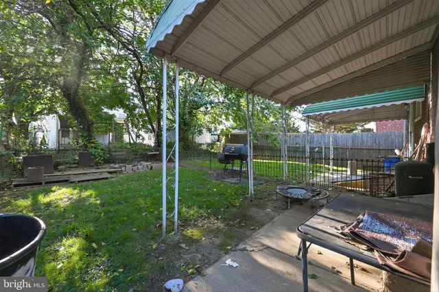 a garden view with a seating space