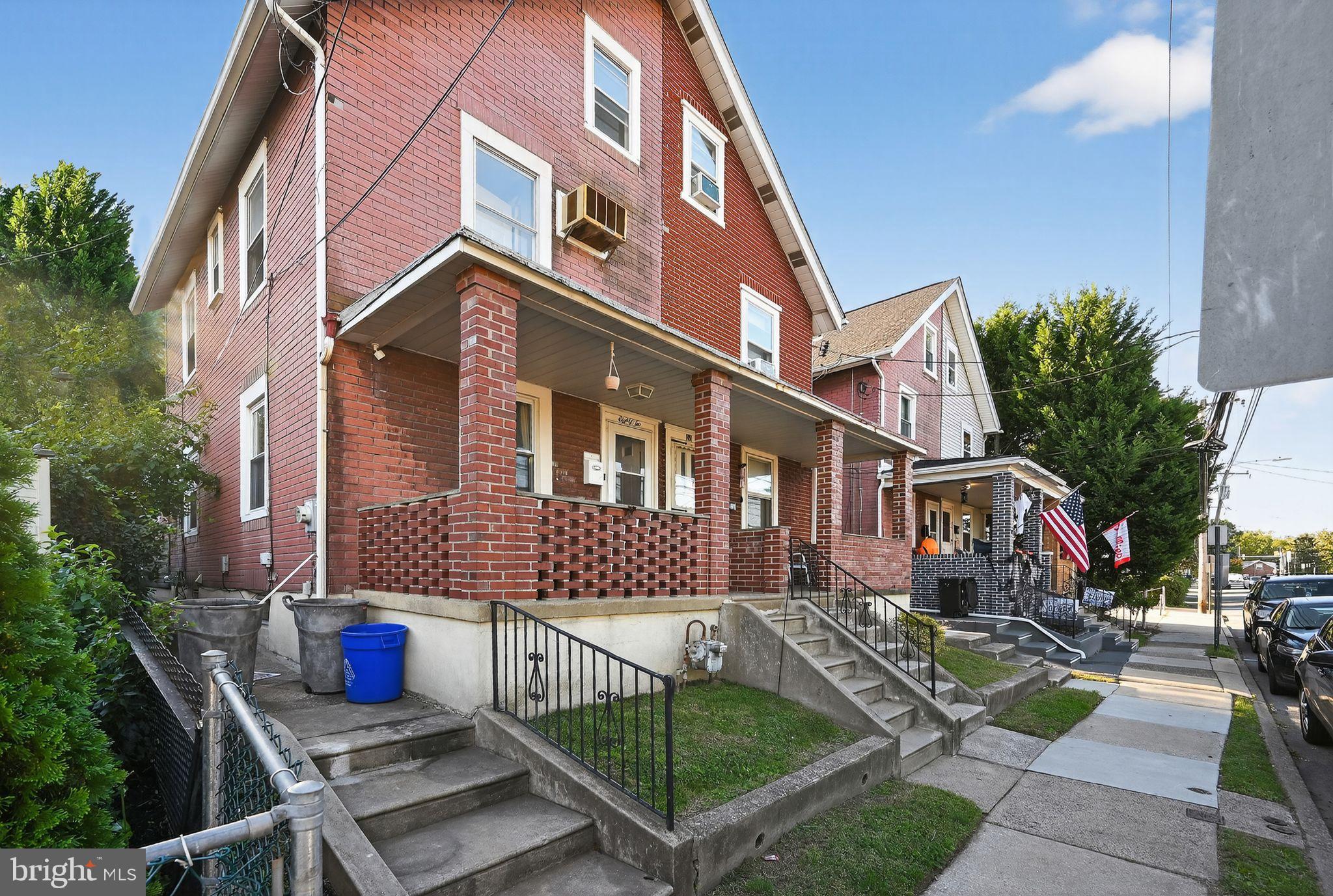 82 Marple Avenue Clifton Heights, PA 19018 - Photo 5 of 30 a front view of a house with garden