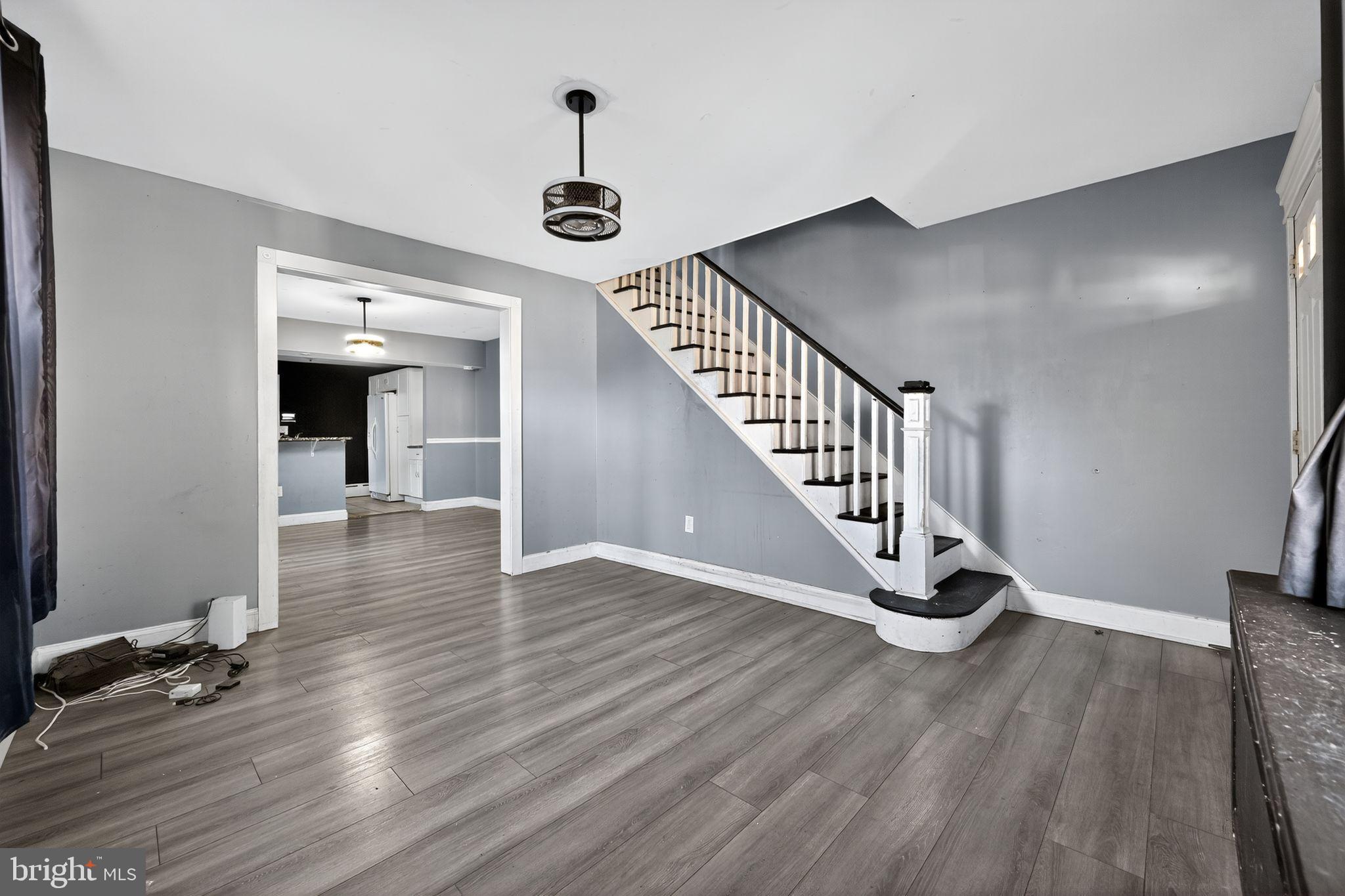 82 Marple Avenue Clifton Heights, PA 19018 - Photo 7 of 30 a view of a hallway with wooden floor and staircase