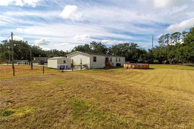 a view of balcony with furniture