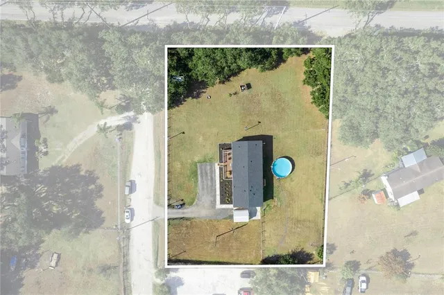 a living room with furniture a chandelier and a closet