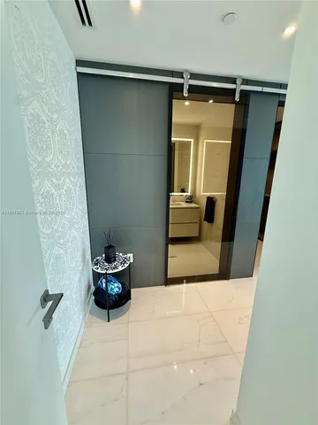 a bathroom with a sink and toilet