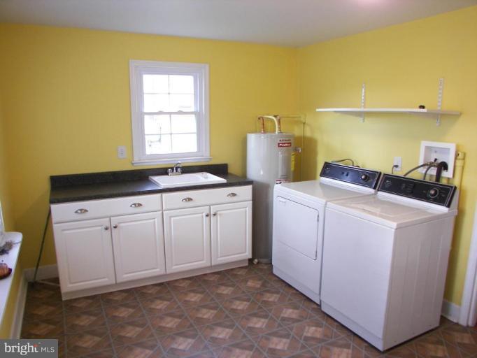 6790 Winchester Grade Road Berkeley Springs, WV 25411 - Photo 9 of 13 Separate Laundry Room