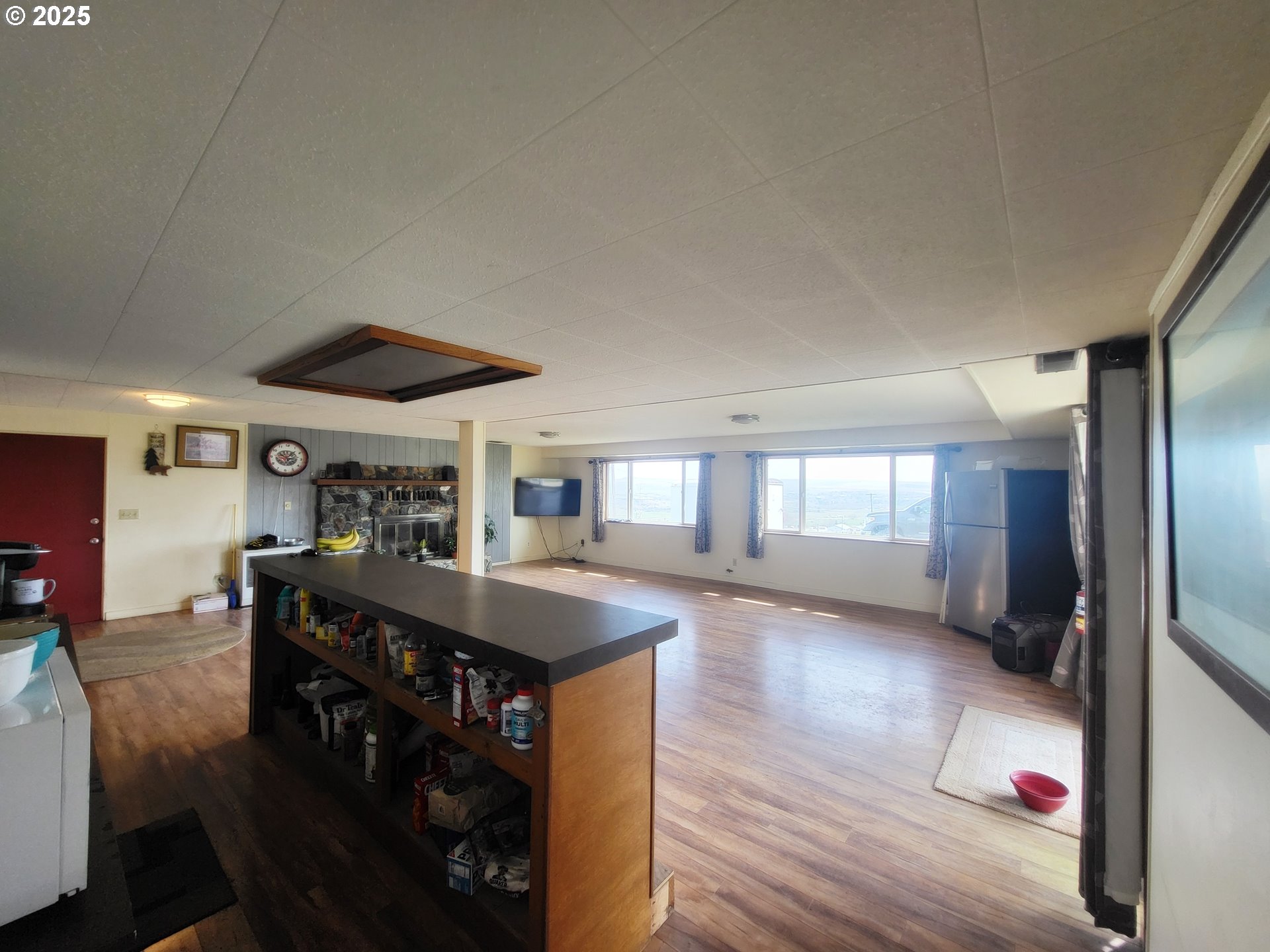 81202 Reavis Lane Enterprise, OR 97828 - Photo 31 of 44 a kitchen with stainless steel appliances granite countertop a stove and a refrigerator
