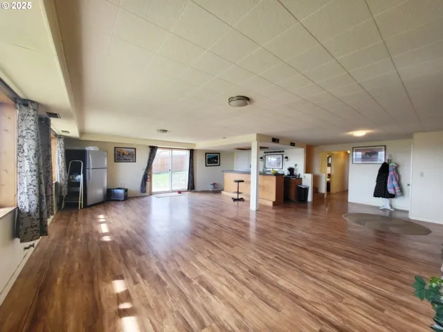 a view of a living room and hardwood floor