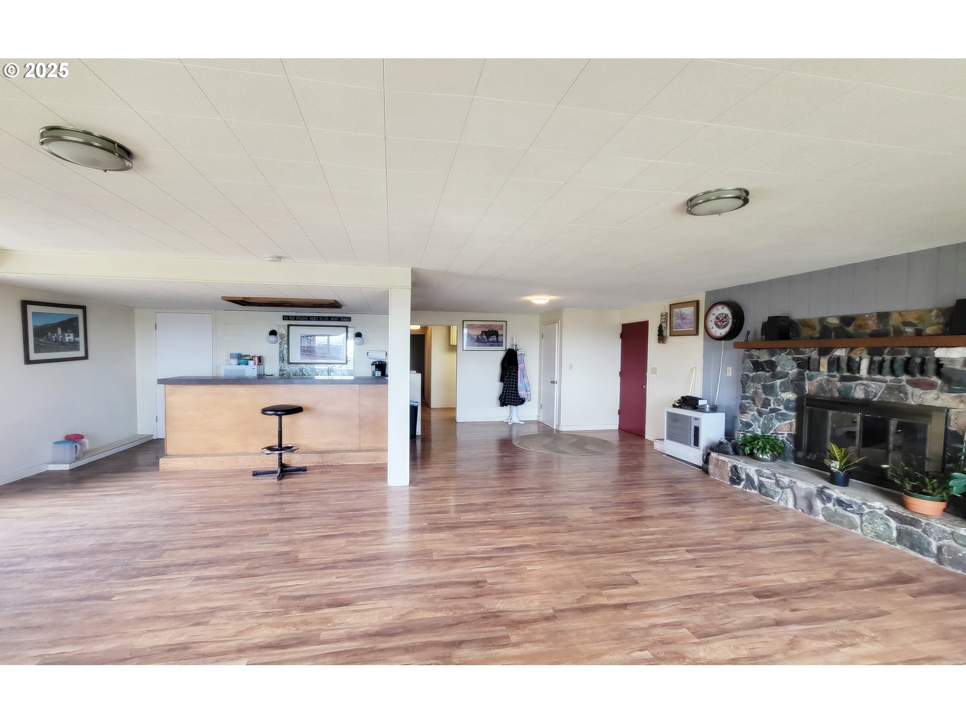 81202 Reavis Lane Enterprise, OR 97828 - Photo 35 of 44 a view of a living room and kitchen island furniture