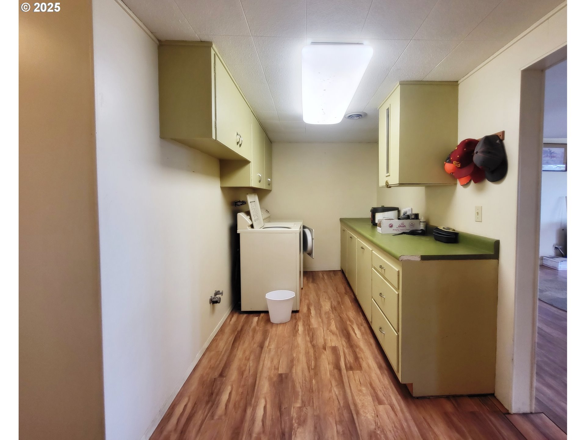 81202 Reavis Lane Enterprise, OR 97828 - Photo 36 of 44 a kitchen with a wooden floor and a sink