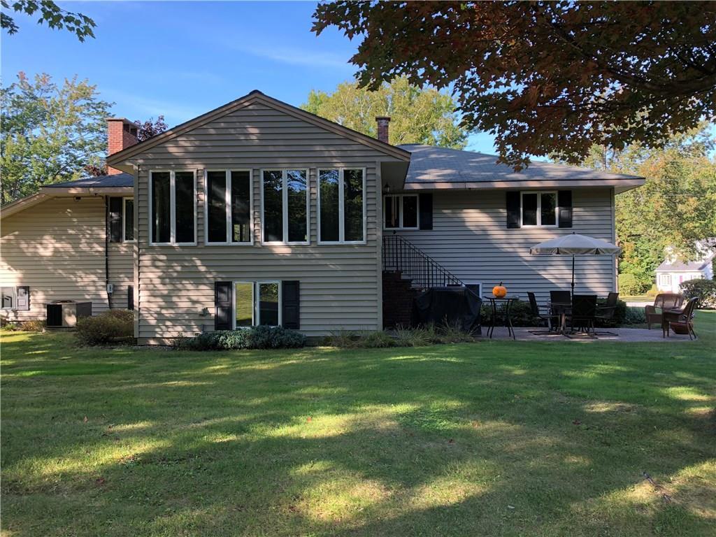 7 Riverview Road Jay, ME 04239 - Photo 2 of 35 Views of the sunroom and stone patio...
