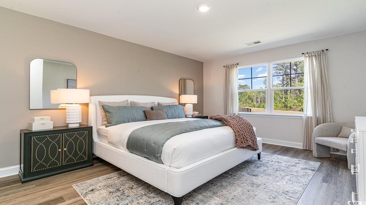 112 Fair Meadow Loris, SC 29569 - Photo 19 of 23 Bedroom featuring hardwood / wood-style floors