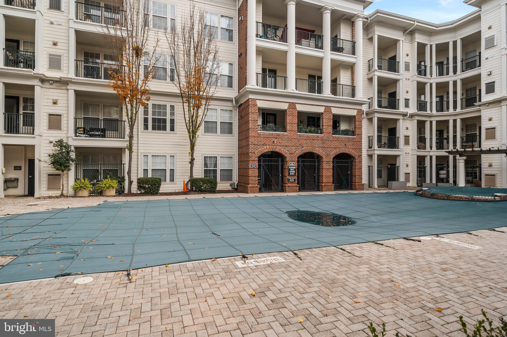 8 Granite Place, Unit 266 Gaithersburg, MD 20878 - Photo 34 of 36 a view of a building with a yard