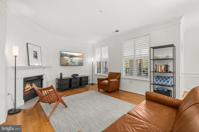 a living room with furniture or couch and a window