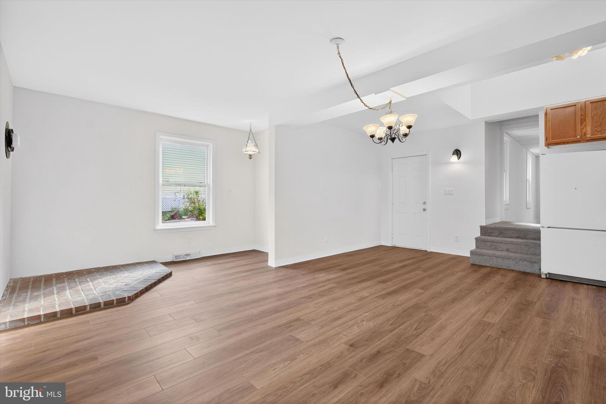 2147 Cloverleaf Road Mount Joy, PA 17552 - Photo 11 of 37 a view of an empty room with wooden floor and a window