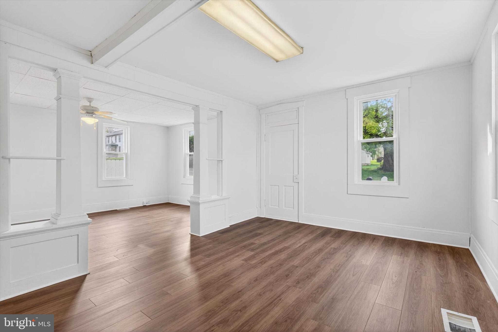 2147 Cloverleaf Road Mount Joy, PA 17552 - Photo 5 of 37 an empty room with wooden floor and windows