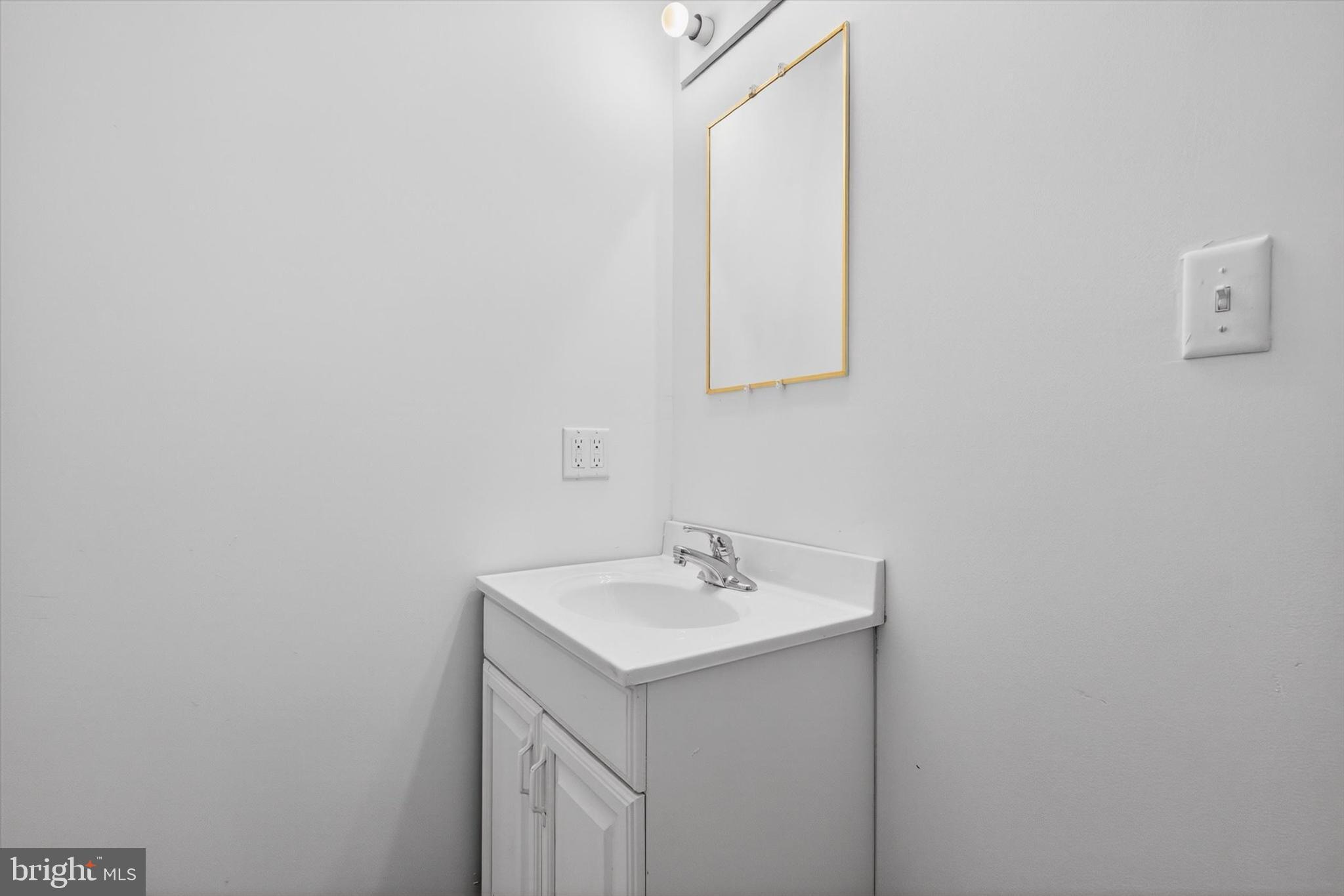 2147 Cloverleaf Road Mount Joy, PA 17552 - Photo 7 of 37 a bathroom with a sink and a mirror