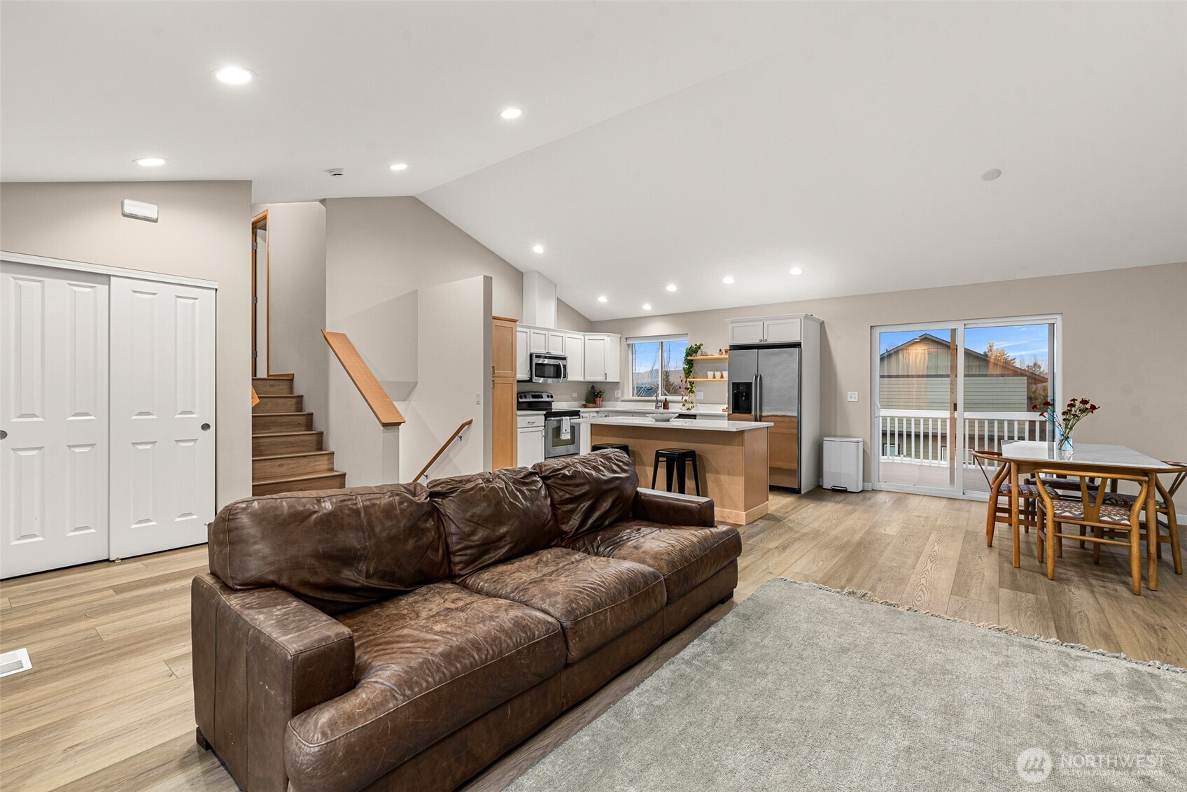 576 Saddle Rock Loop Wenatchee, WA 98801 - Photo 11 of 34 a living room with furniture and a wooden floor