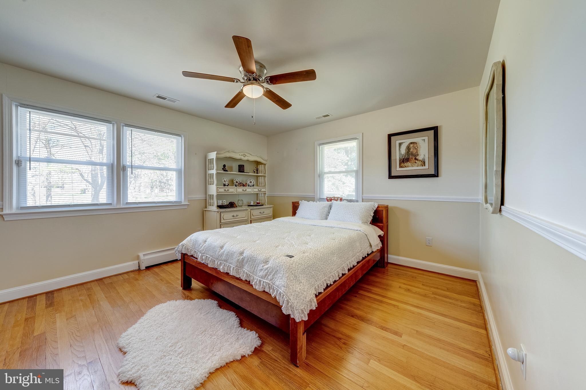 6017 Wheeler Lane Broad Run, VA 20137 - Photo 22 of 45 a bedroom with a bed and window