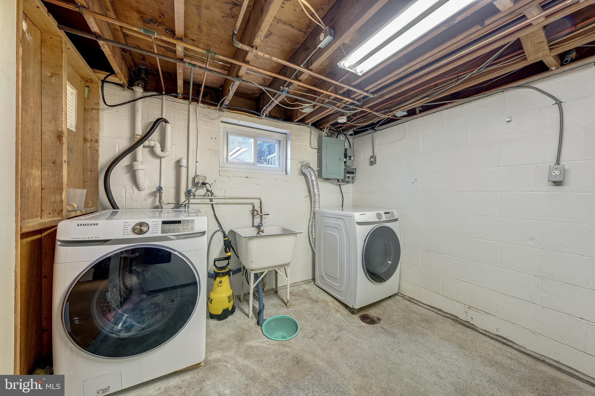 6017 Wheeler Lane Broad Run, VA 20137 - Photo 26 of 45 a utility room with dryer and washer